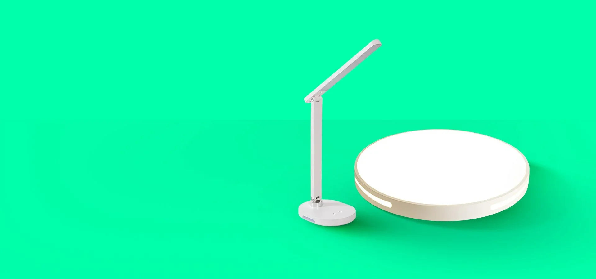 Бяло LED бюро лампа с кръгла основа и модерен дизайн на зелен фон